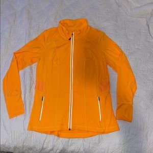 Bright orange zip up jacket